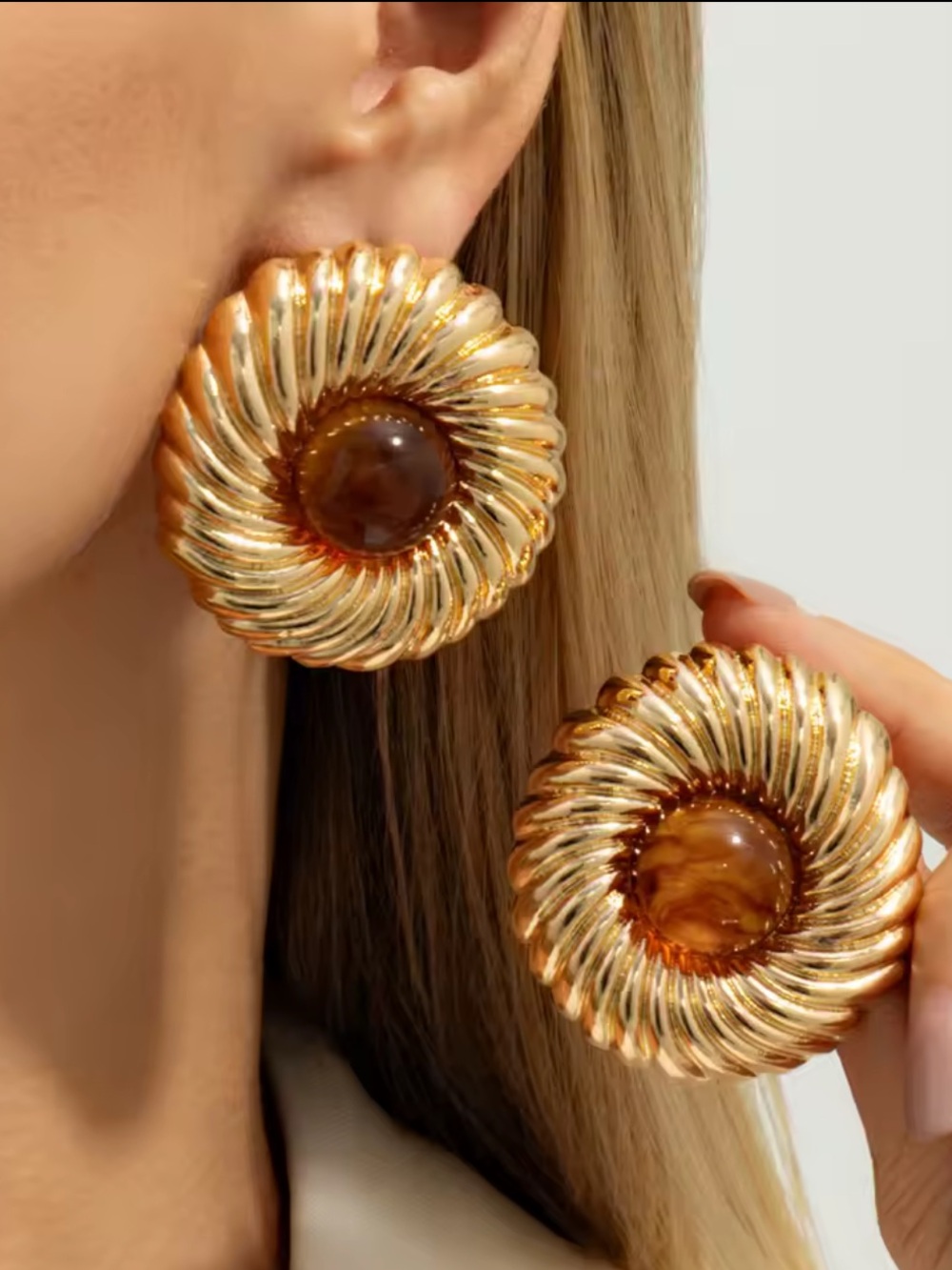 Gold-Tone Swirl Earrings with Amber Center